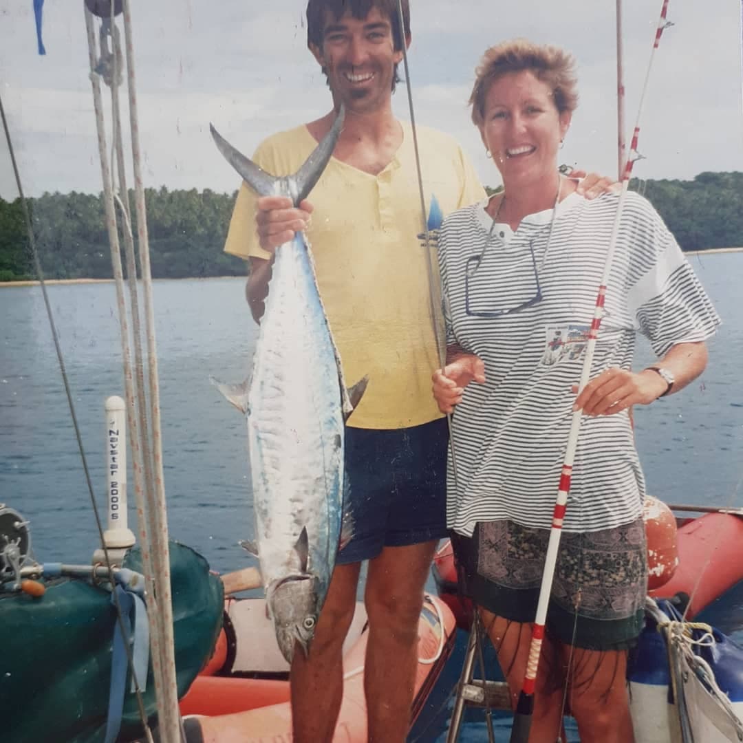 /17b Mopelia Atoll and Aitutaki Cook Islands Glenn and Margie on boat with fish.jpg