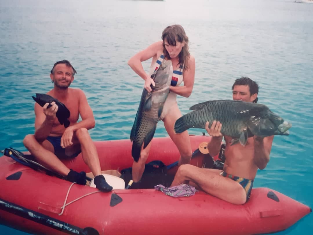 /21b Cocos Keeling Island Glenn on boat with Friends and Fish.jpg